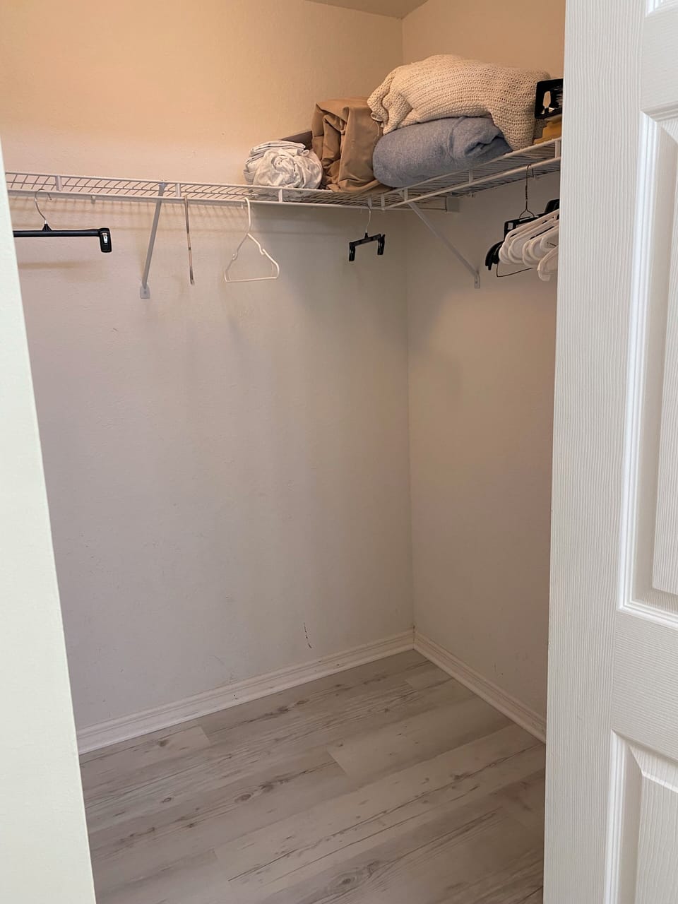 spacious master walk in closet