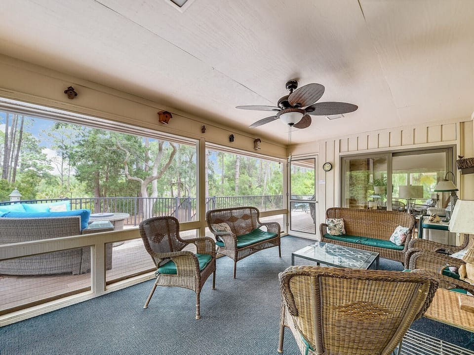 Screened Porch off Living Room with Pool Deck Access at 4 Audubon Pond