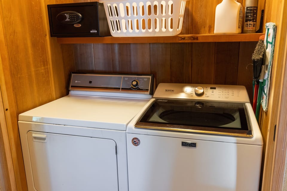 Washer and Dryer located in the hallway off primary bedroom.