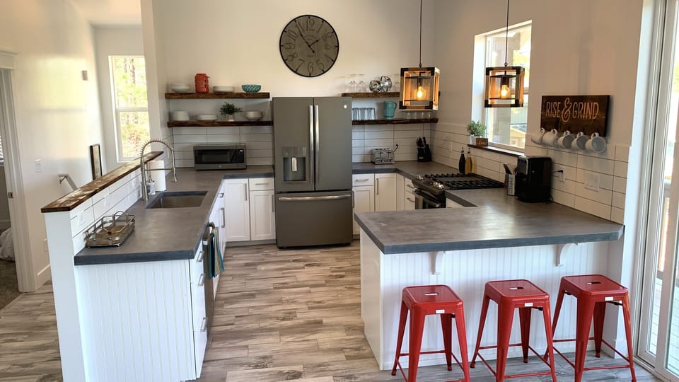 Open Kitchen with high end GE Appliances.