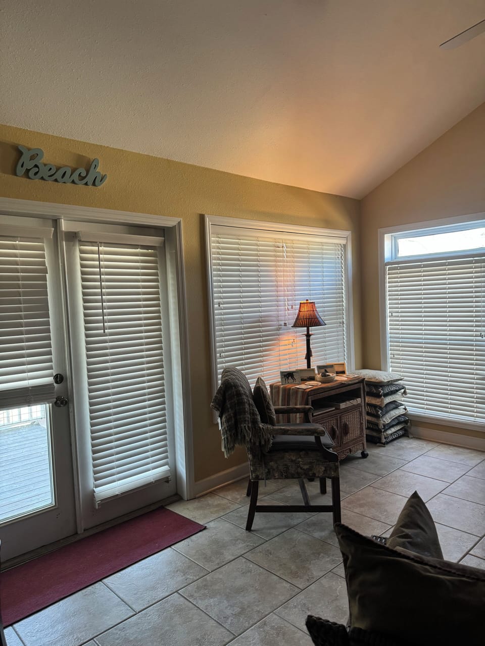 Lots of windows for natural light overlooking balcony porch with St Joe Bay view