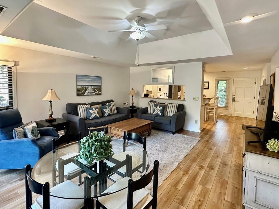 Large living room opens up to the kitchen. Desk area if you need to work.