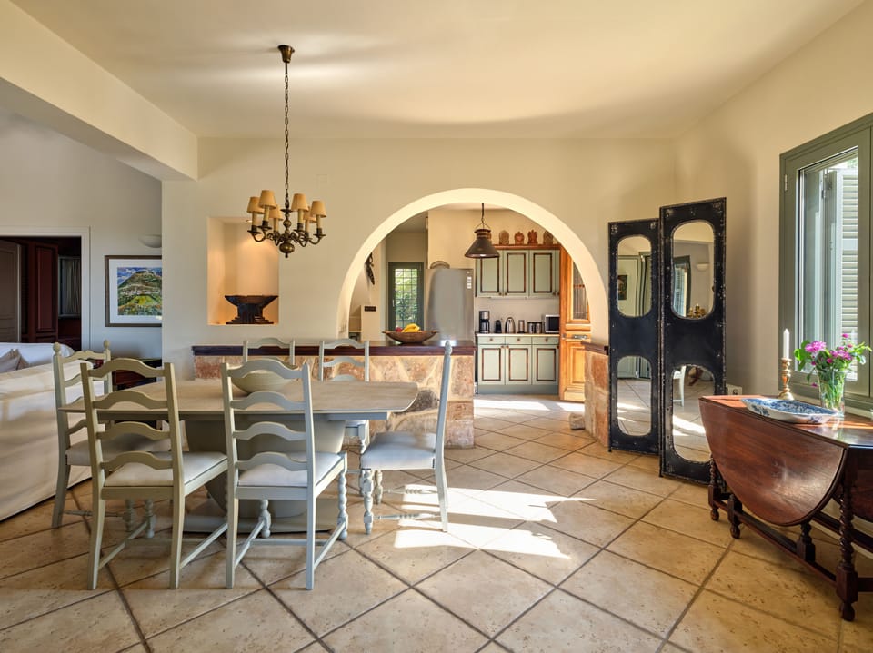The interior dinning area & adjacent kitchen.