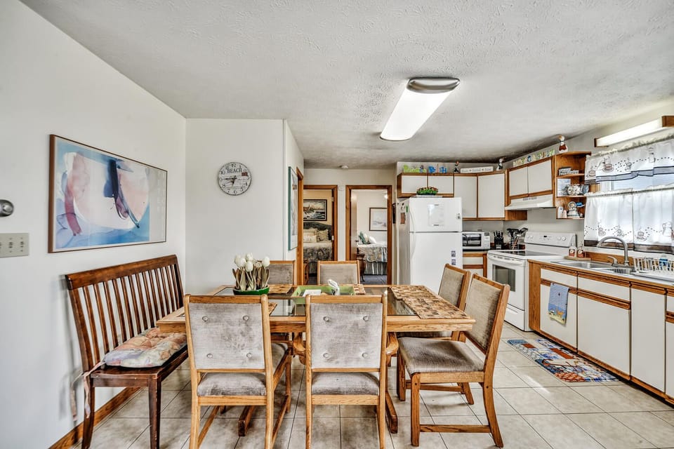 Alternate view of the kitchen and dining area