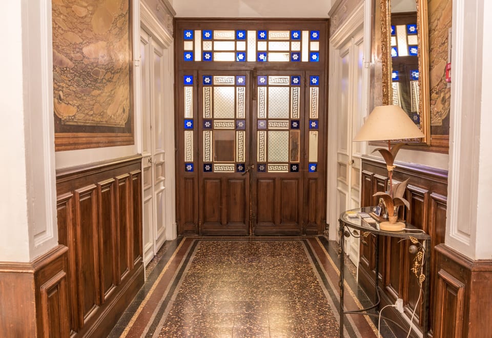 Entrance Hallway at Villa Celine featuring the original porch doors.