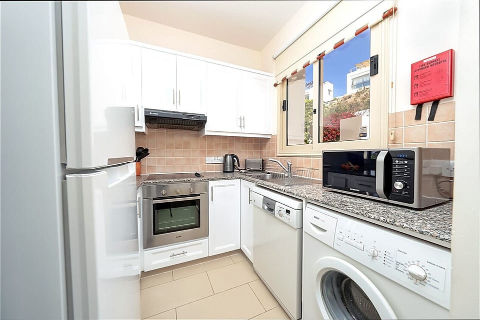 Kitchen includes all the modern items expected of private holiday accommodation.