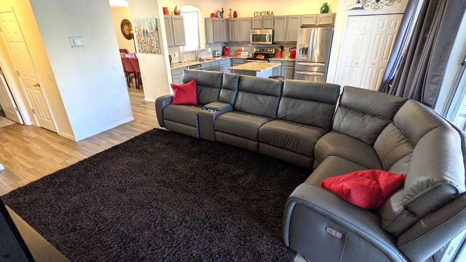 New electric sectional with two recliners for tv viewing.