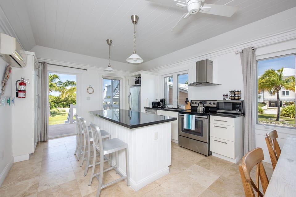 Kitchen with additional bar for seating