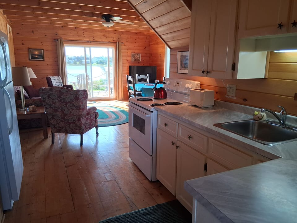 Open concept kitchen, dining and living area makes for easy conversations.