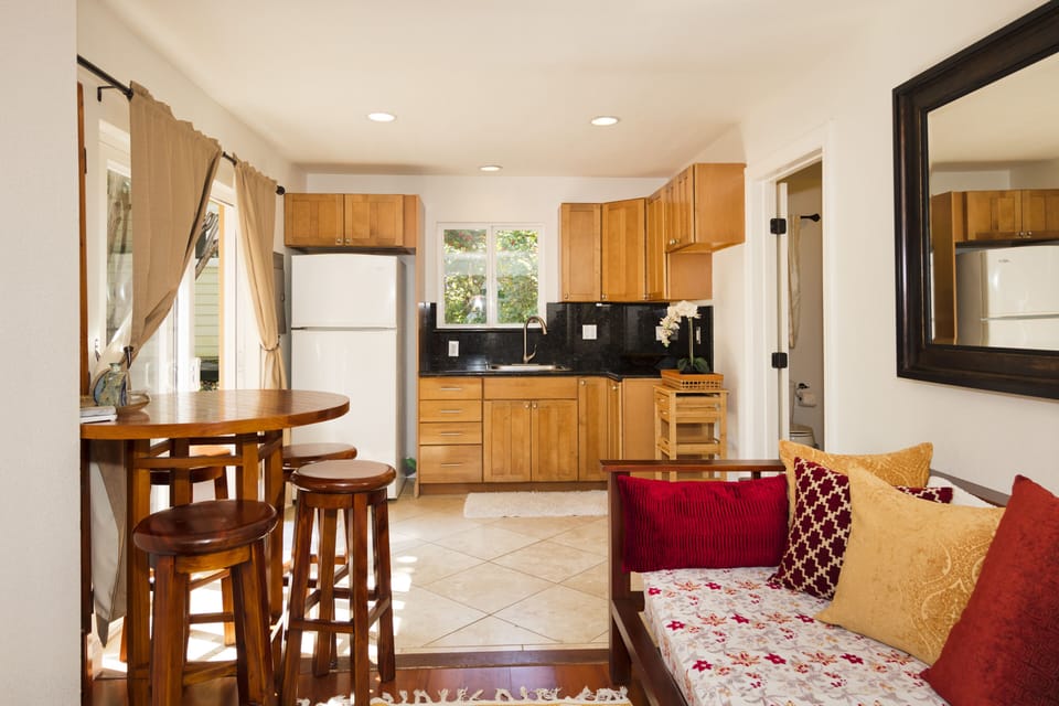 Living area has a day bed with twin size mattress.