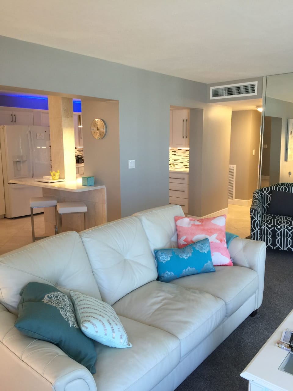 Main Living Area with view of bar stools and kitchen