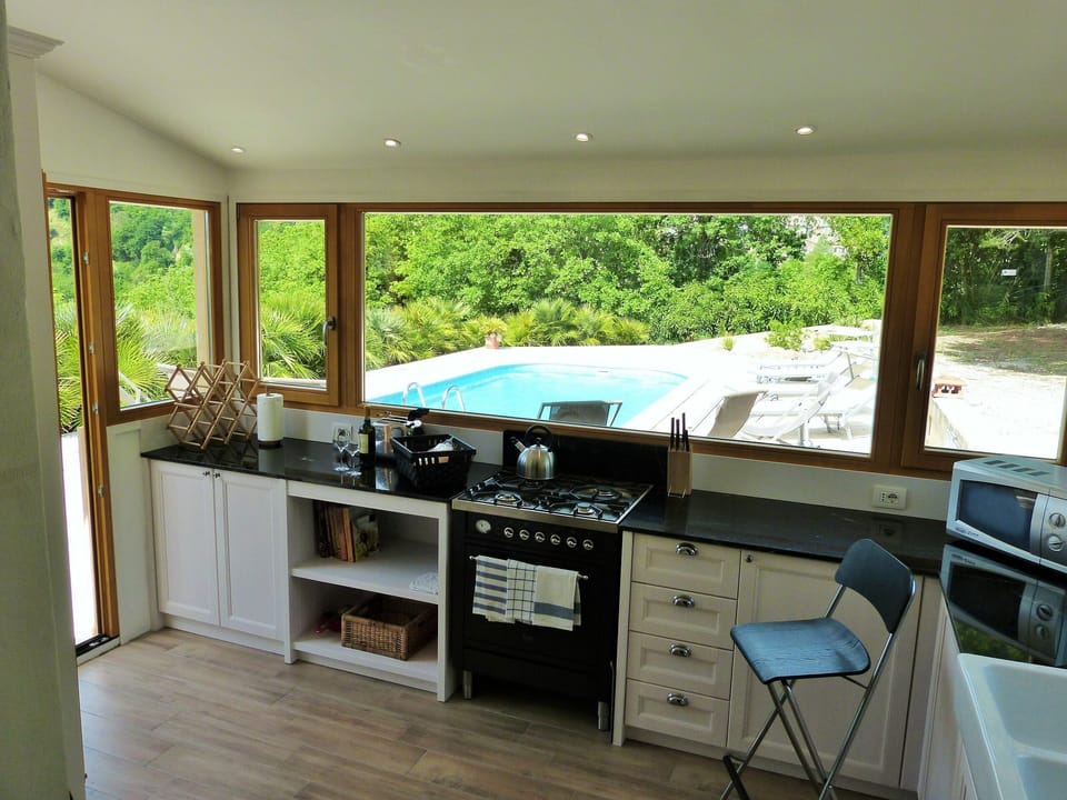 Kitchen over looking the pool
