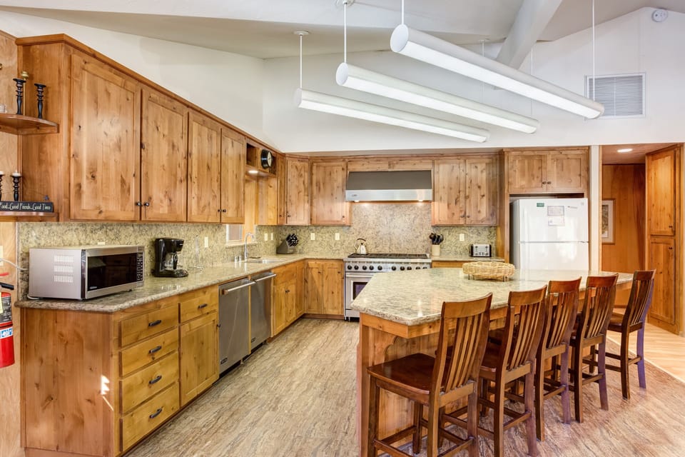 Newly remodeled kitchen with 8 burner stove, 2 ovens and 2 dishwashers
