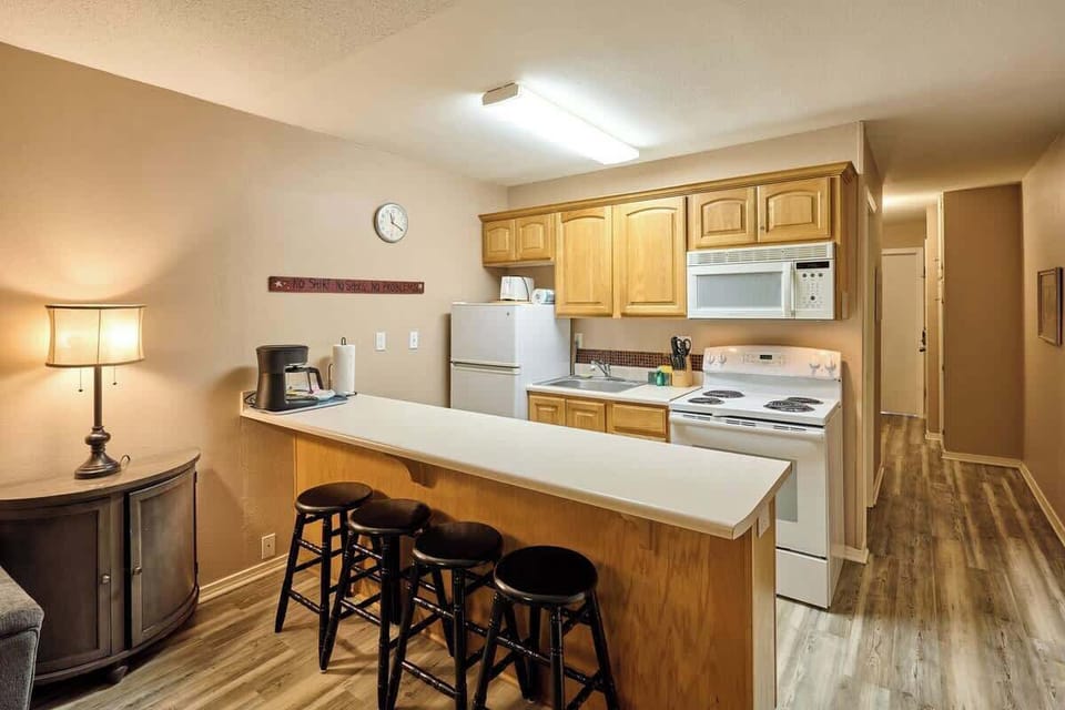 Full-size appliances and all the kitchenware you need are right here