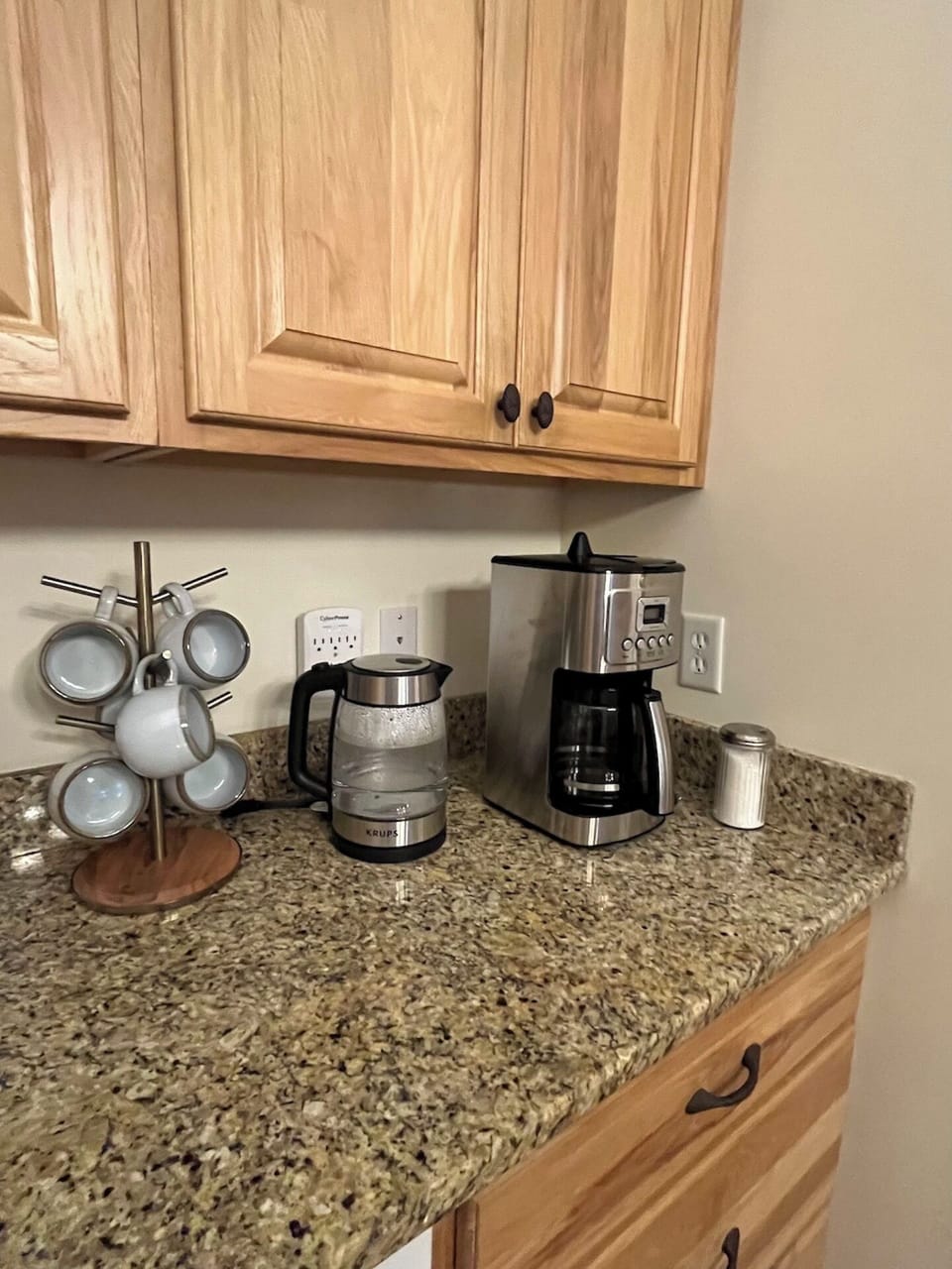 Coffee & tea bar...sugar & other sweeteners in the cabinet above