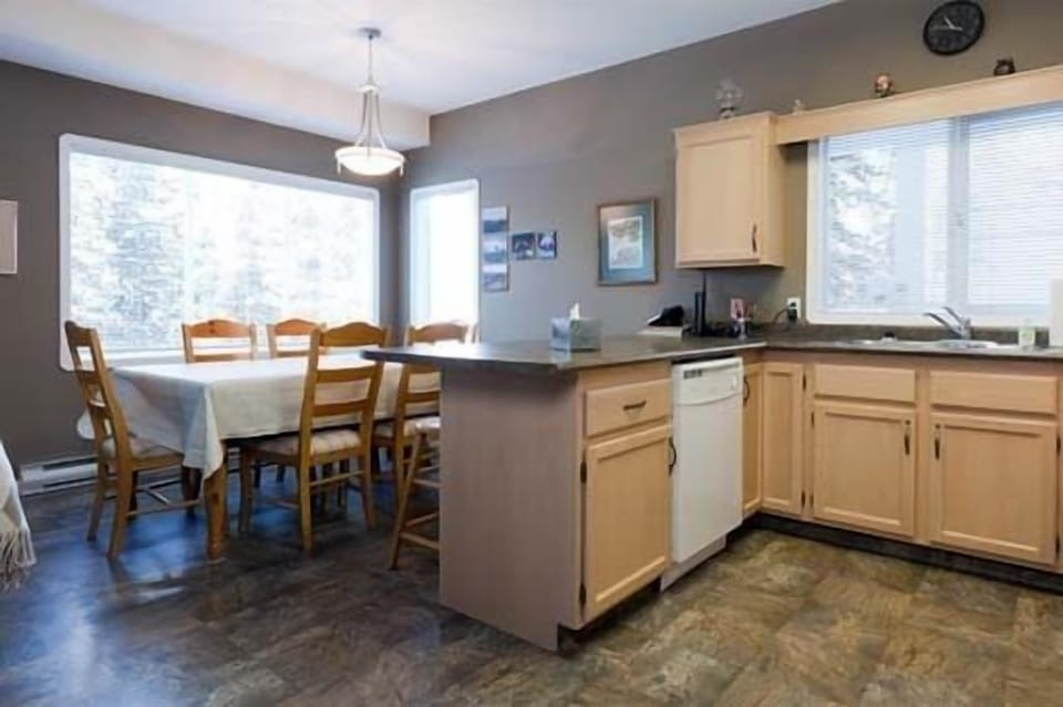 New Countertops, Flooring and Extra Barstools to Sit at the Breakfast Bar