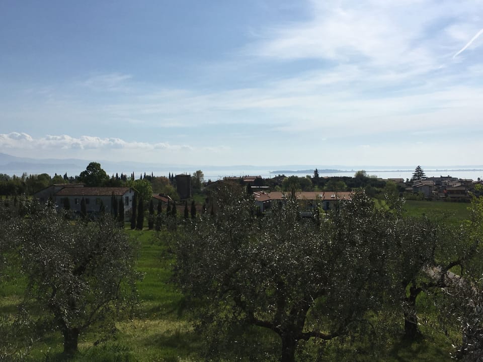 A quiet terrace with a breathtaking view of Lake Garda  Apartment in Province of Brescia