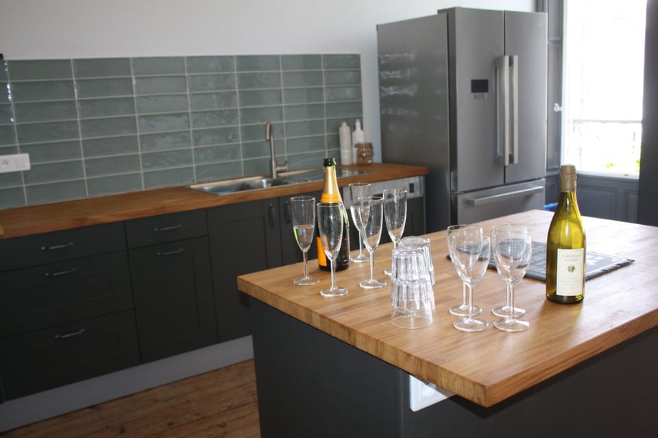 Kitchen with Island unit leading to dining area