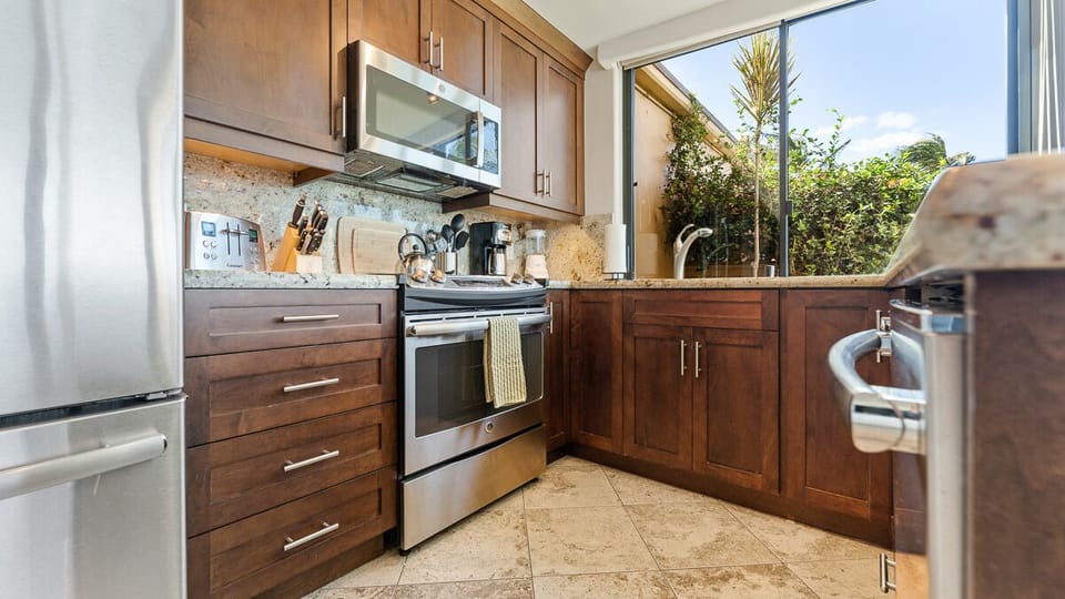 Flat top stove with 5 burners.