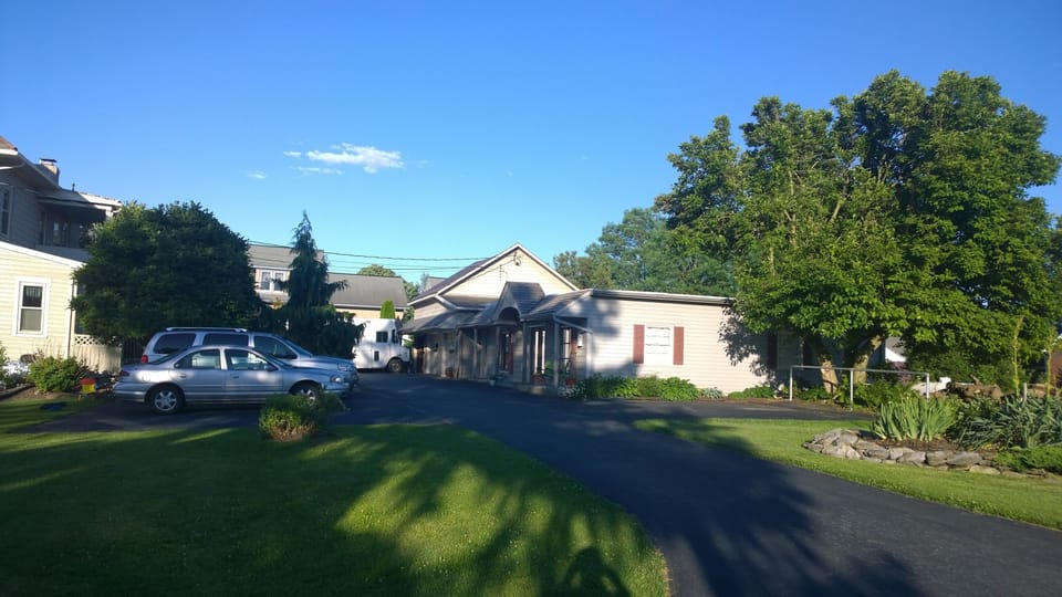 Property from S Hershey Avenue.  Main residence on the left.