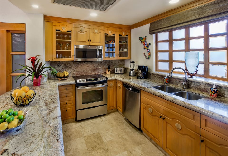 Kitchen with new granite and appliances.