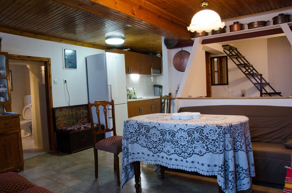 Ground floor: a fully equipped kitchen, bathroom,  stairs lead to 1st floor