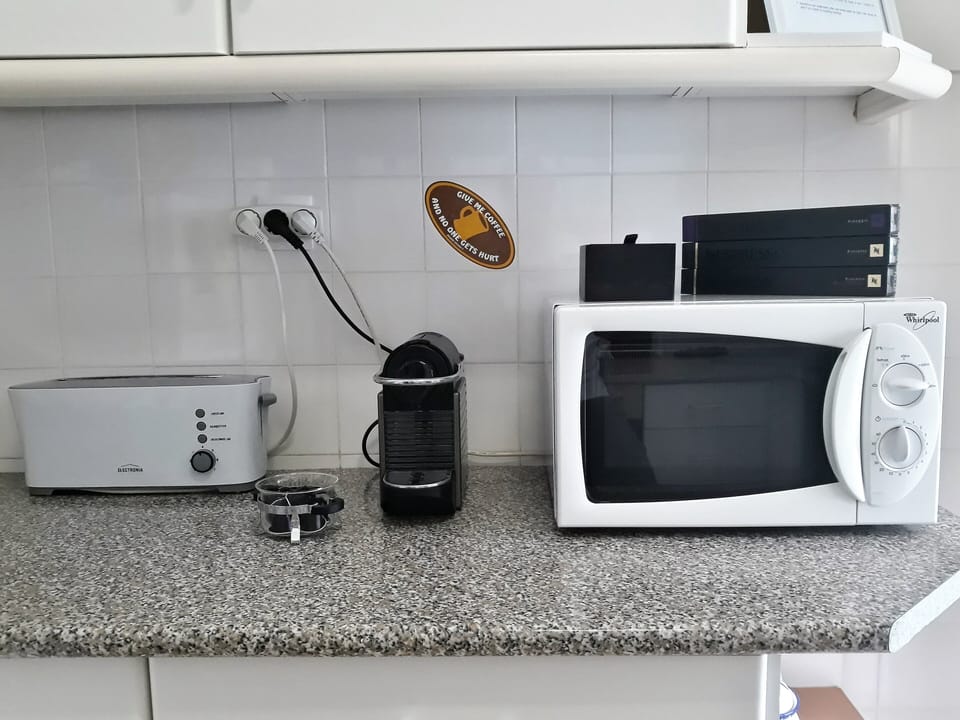Nespresso, toaster and microwave.