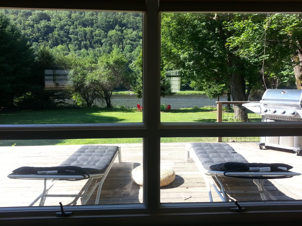 Inside or out, endless river and unspoiled mountains views are in your backyard