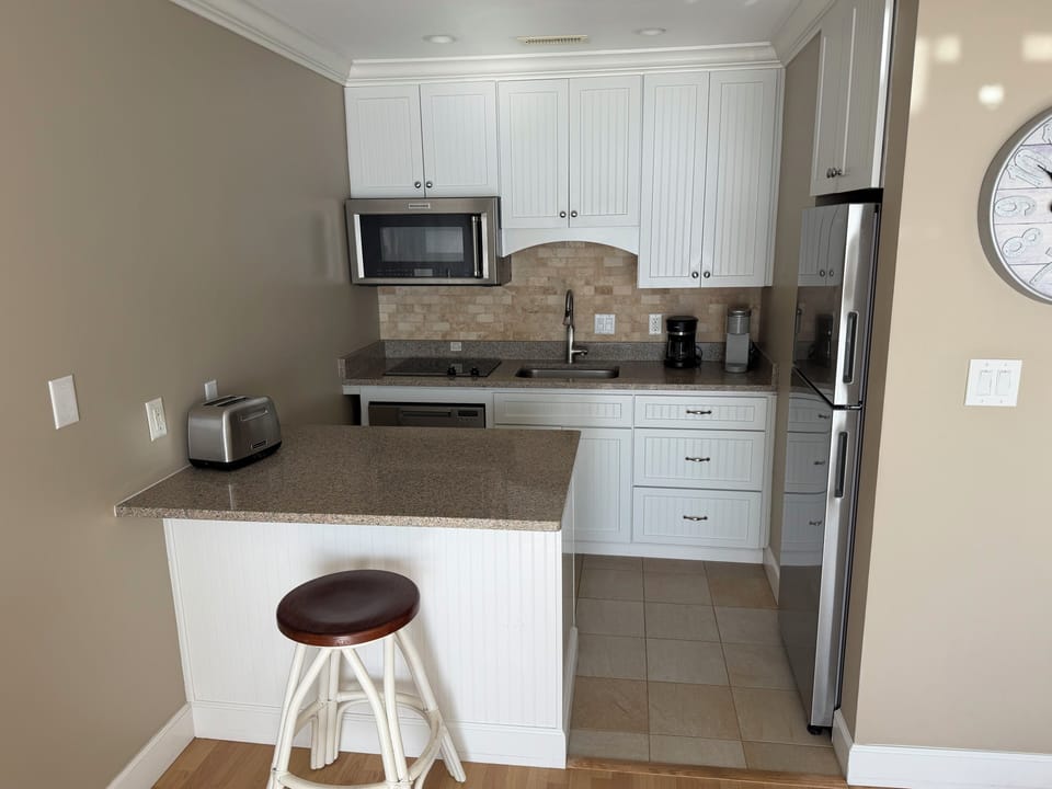 Kitchen area off of living room/dining area.