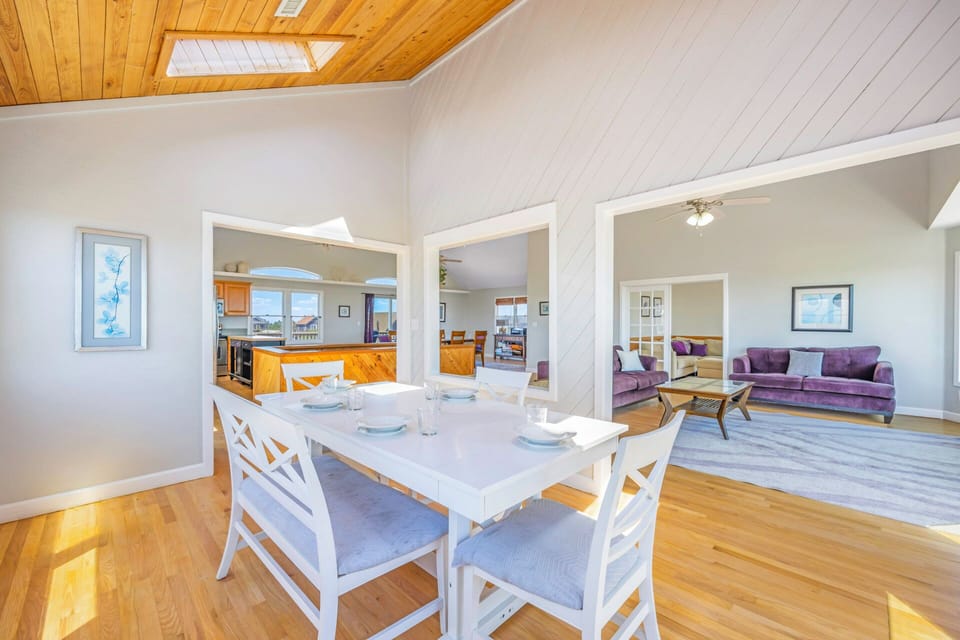 Your spacious dining area flows seamlessly into the living room and kitchen, creating perfect spaces for memorable meals and relaxation.