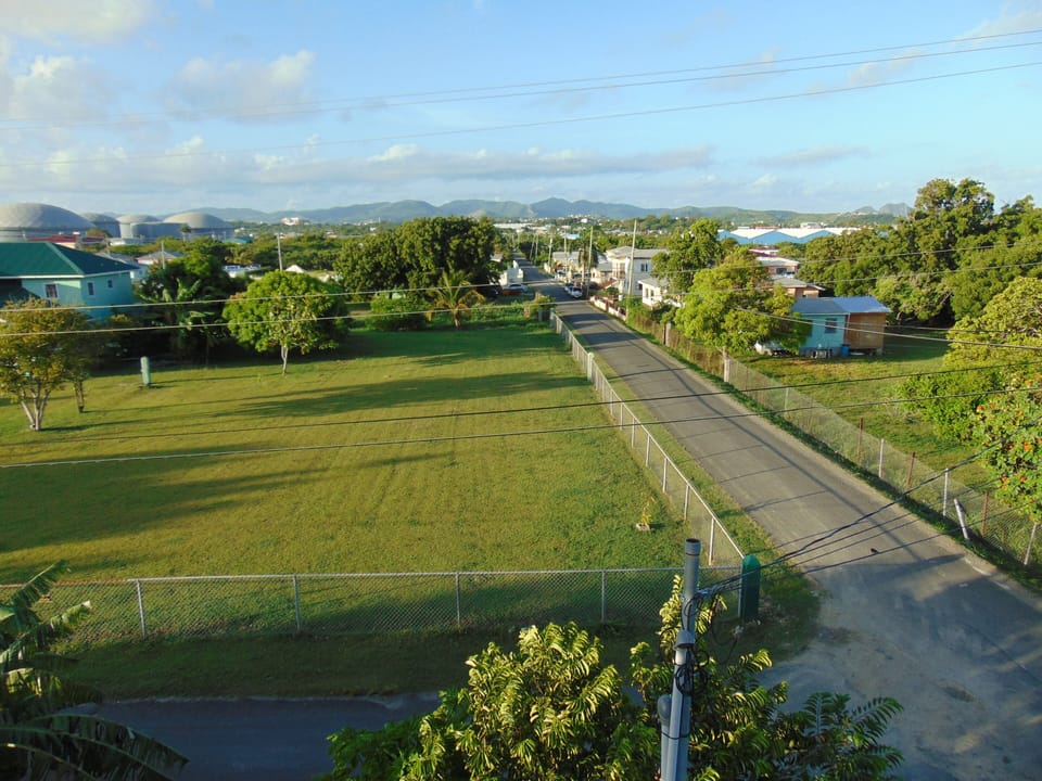 Evanson's Road to 1st Choice Supermarket and St. John's City.