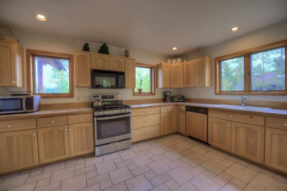 The fully equipped kitchen is a perfect place to cook a family meal