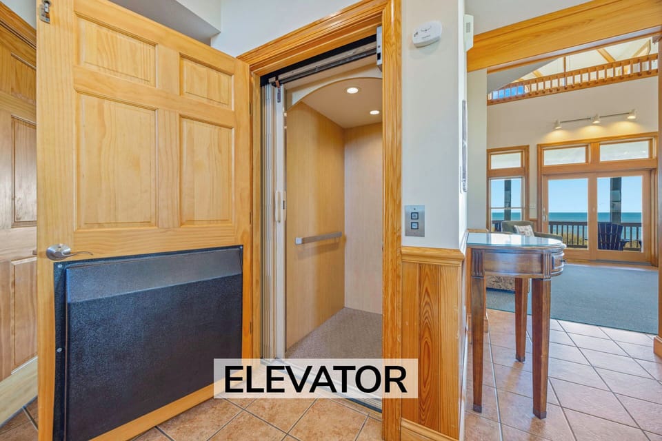 Surf or Sound Realty - 369 - Sea Mist - Elevator - Label
