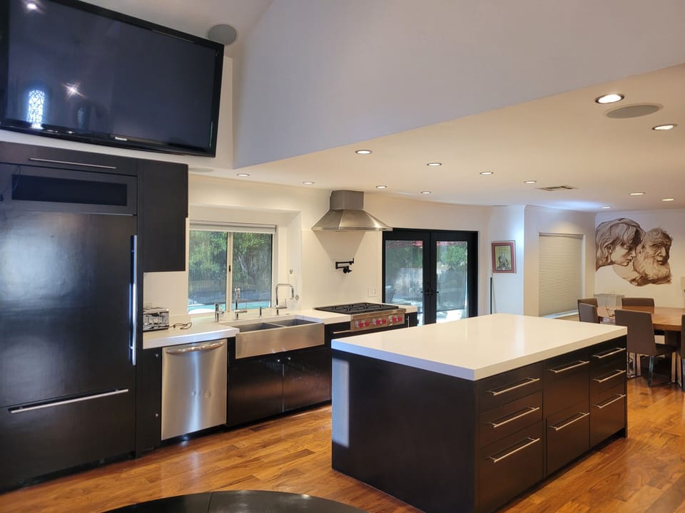 Extra large fridge & freezer, massive center island, seating for 12 in dining rm