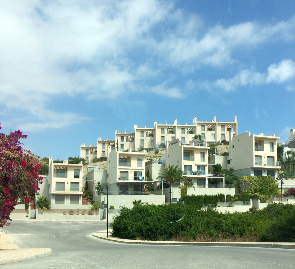 Villa on the left next to the Bougainvillea is Sueno La Mar, beach is on right.