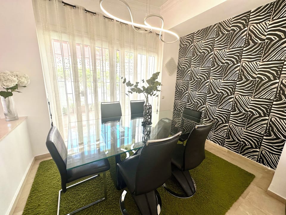 Dinning area with comfortable seating for up to  six guests.