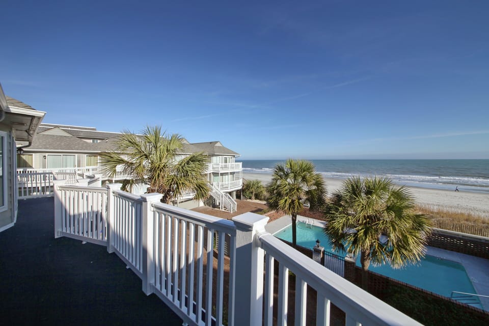 Beach and pool view from the upper balcony