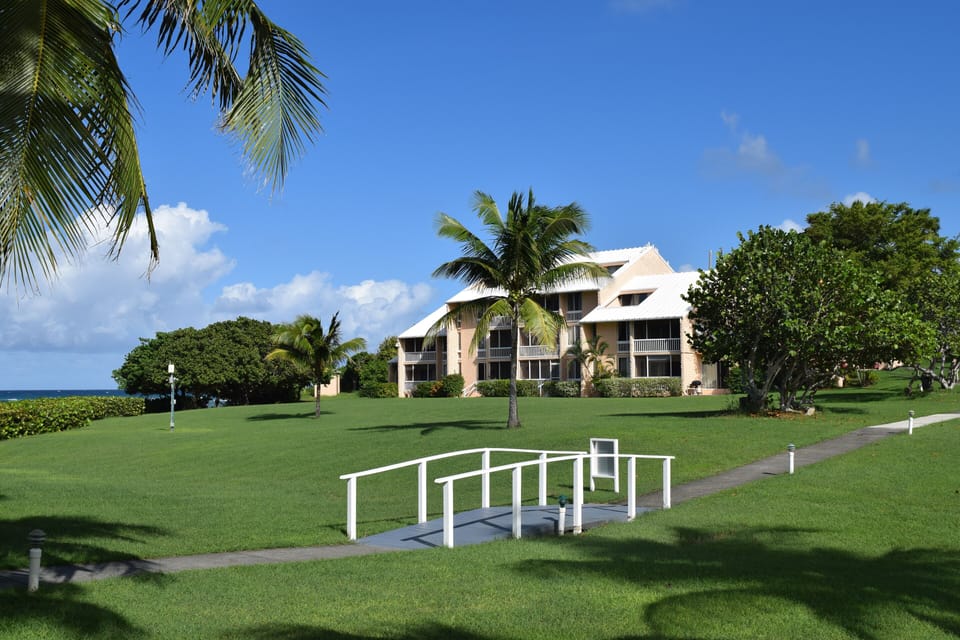 View from pool, beach to left. Unit bottom left of tallest section.