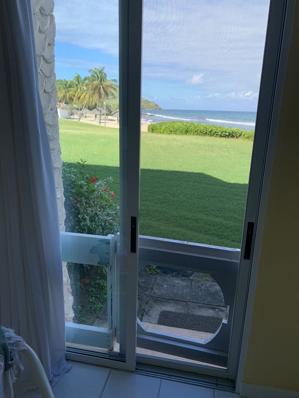 Door from front bedroom leads right to beach