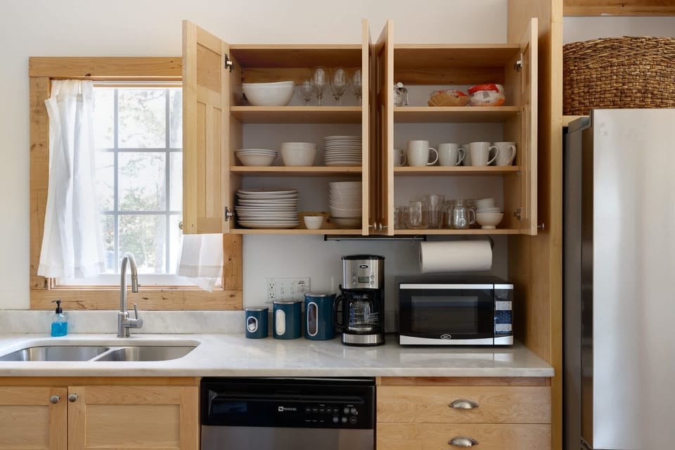 The house is stocked with cookingware, cleaning supplies, plates and cups to enjoy meals at home!