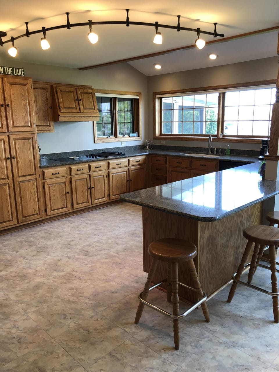 Spacious kitchen with view to lake.