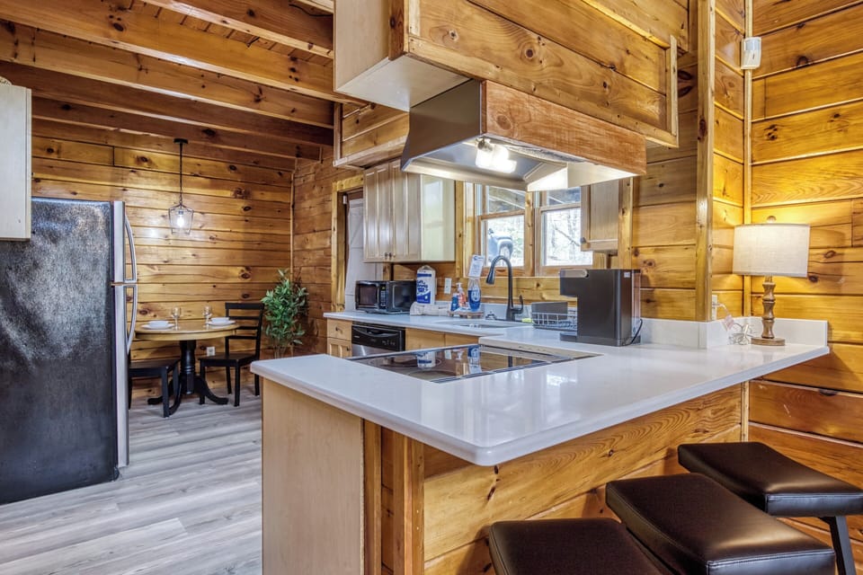 Pet Friendly Cabin in Pigeon Forge "Sweet Dreams" - Bar top, fully furnished kitchen, and dining area