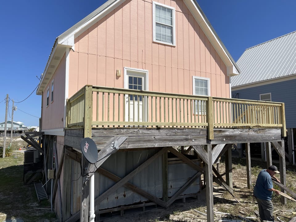 Back of the house. Replaced deck in April 2022.