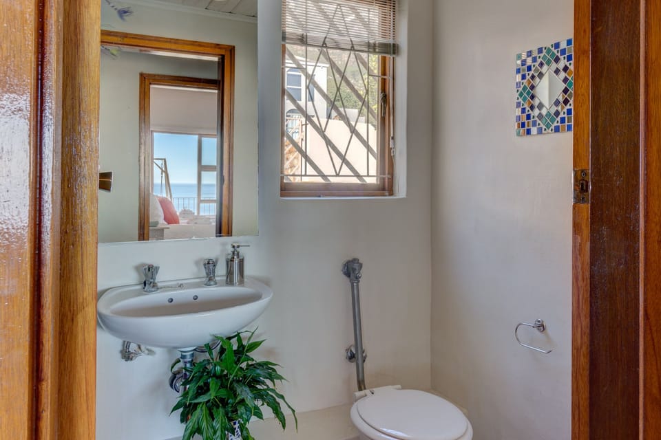 The toilet & basin across the hall from the 2nd & 3rd bedrooms