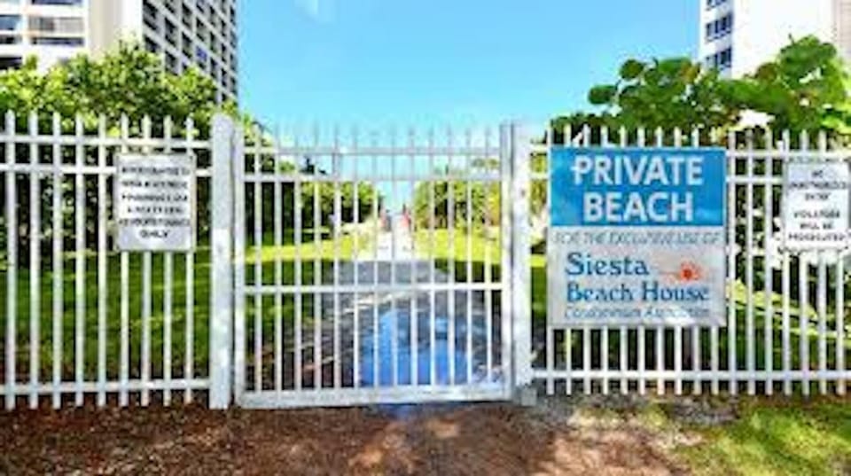 Gate to private beach 2 min walk from building