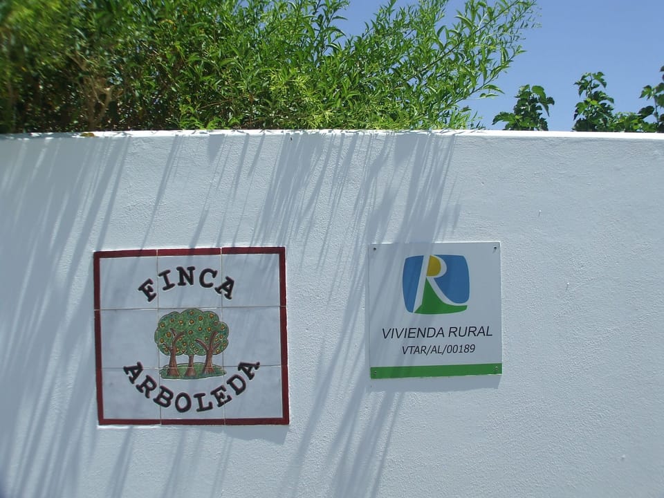 Outside Finca Arboleda, showing rental licence.