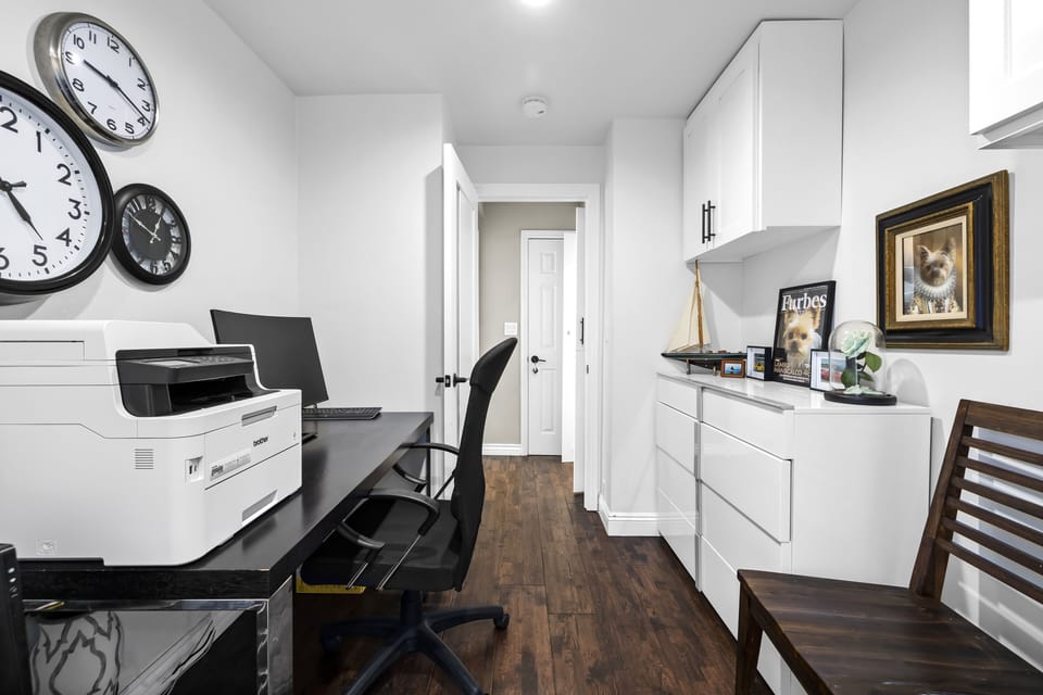 Office in center of unit with Computer Monitor and Printer