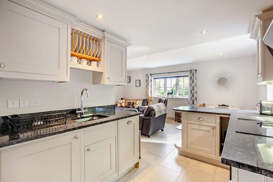 Hand made kitchen units with granite worktops