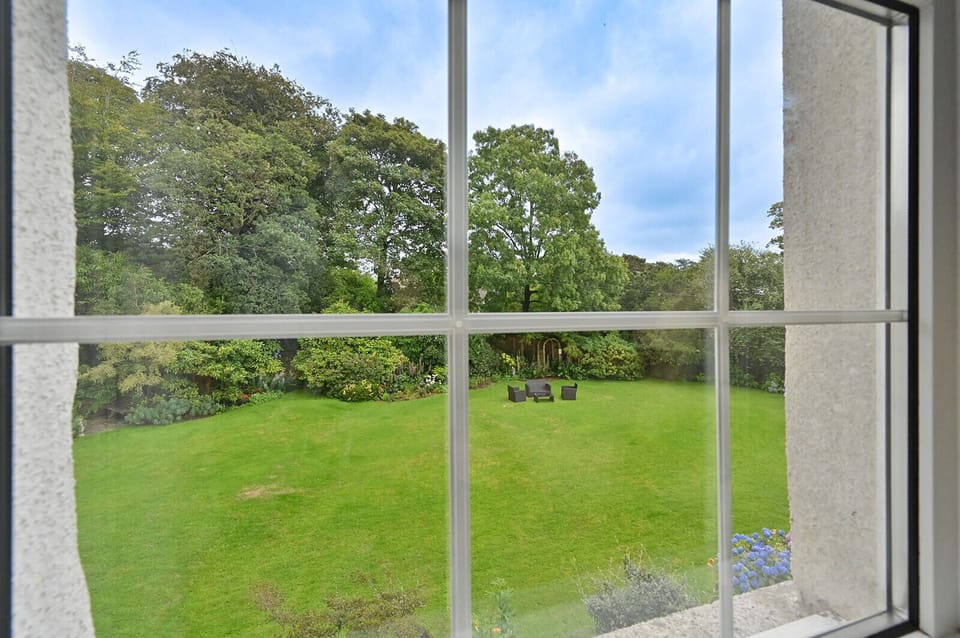 Views across the east lawn from the twin and main bedroom