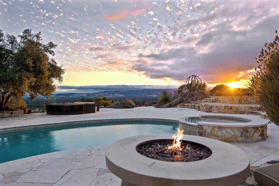 Poolside firpit seating area overlooking Sonoma Valley views and epic sunsets